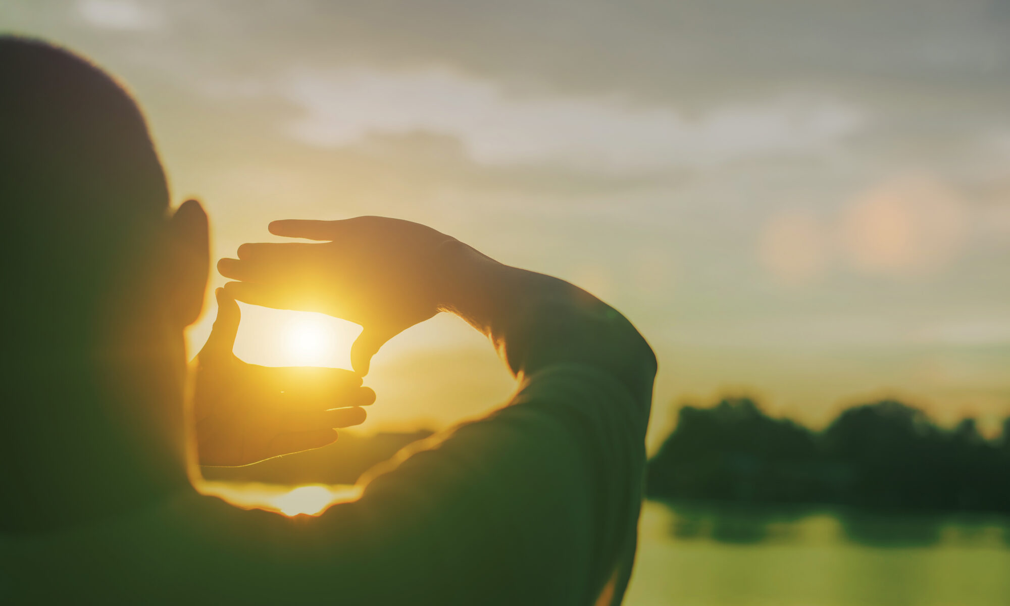 The,Man,Making,Frame,Round,The,Sun,With,Her,Hands